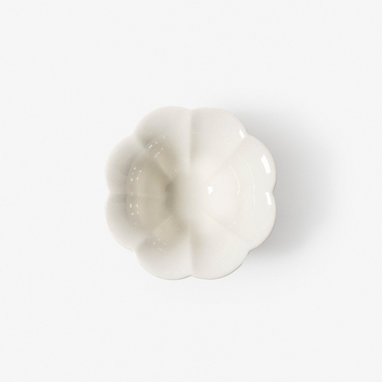 A refined Dehua porcelain teaware and tableware piece, crafted in the kilns of Fujian with a legacy dating back to ancient China; this minimalist yet culturally rich ceramic reflects the purity of Eastern craftsmanship, blending seamlessly into modern interiors inspired by Chinese tradition, ritual, and timeless design. Hog Lane, London Based Chinese homeware UK