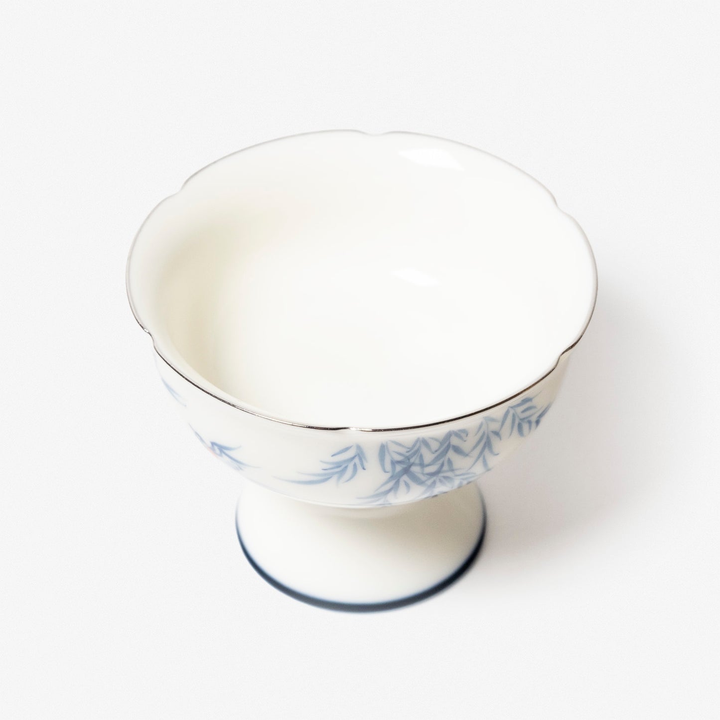 A refined Dehua porcelain teaware and tableware piece, crafted in the kilns of Fujian with a legacy dating back to ancient China; this minimalist yet culturally rich ceramic reflects the purity of Eastern craftsmanship, blending seamlessly into modern interiors inspired by Chinese tradition, ritual, and timeless design. Hog Lane, London Based Chinese homeware UK