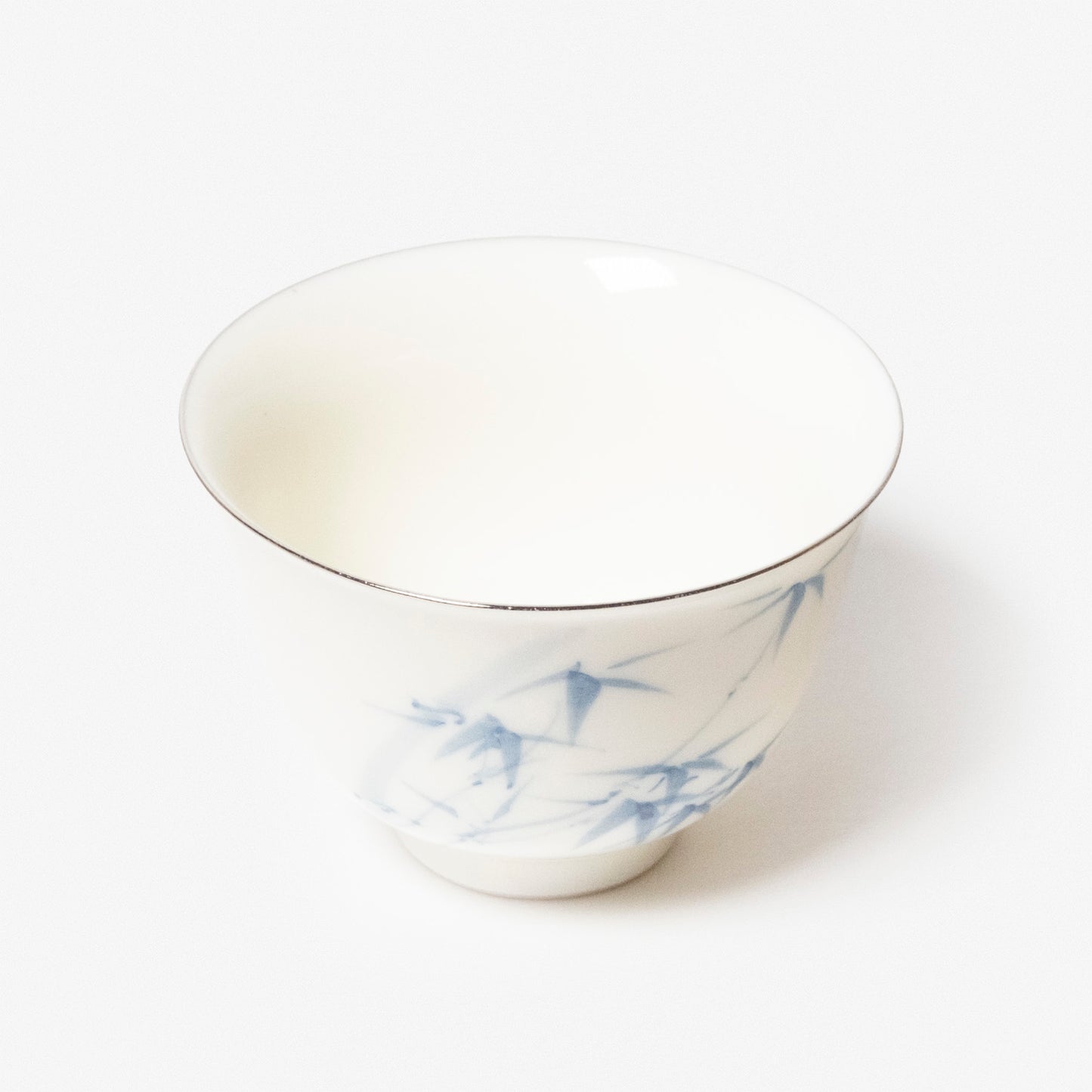 A refined Dehua porcelain teaware and tableware piece, crafted in the kilns of Fujian with a legacy dating back to ancient China; this minimalist yet culturally rich ceramic reflects the purity of Eastern craftsmanship, blending seamlessly into modern interiors inspired by Chinese tradition, ritual, and timeless design. Hog Lane, London Based Chinese homeware UK