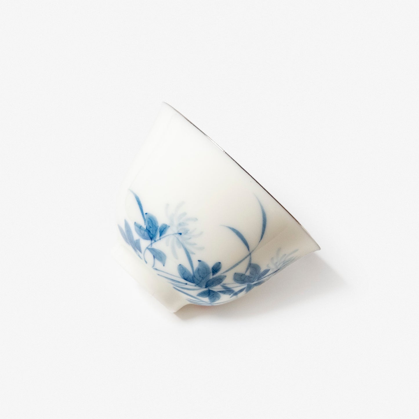 A refined Dehua porcelain teaware and tableware piece, crafted in the kilns of Fujian with a legacy dating back to ancient China; this minimalist yet culturally rich ceramic reflects the purity of Eastern craftsmanship, blending seamlessly into modern interiors inspired by Chinese tradition, ritual, and timeless design. Hog Lane, London Based Chinese homeware UK