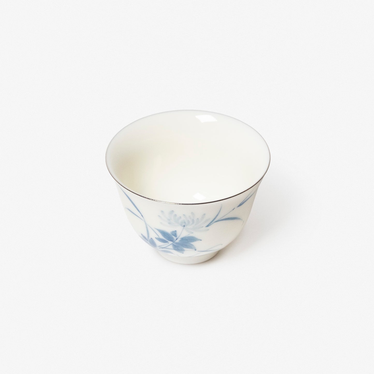 A refined Dehua porcelain teaware and tableware piece, crafted in the kilns of Fujian with a legacy dating back to ancient China; this minimalist yet culturally rich ceramic reflects the purity of Eastern craftsmanship, blending seamlessly into modern interiors inspired by Chinese tradition, ritual, and timeless design. Hog Lane, London Based Chinese homeware UK