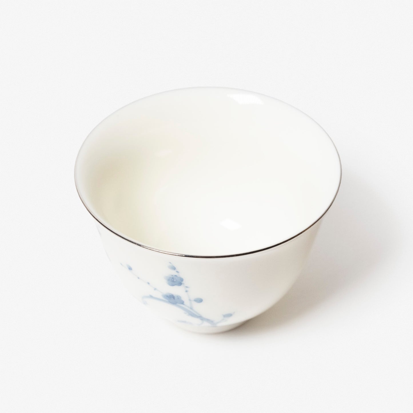 A refined Dehua porcelain teaware and tableware piece, crafted in the kilns of Fujian with a legacy dating back to ancient China; this minimalist yet culturally rich ceramic reflects the purity of Eastern craftsmanship, blending seamlessly into modern interiors inspired by Chinese tradition, ritual, and timeless design. Hog Lane, London Based Chinese homeware UK