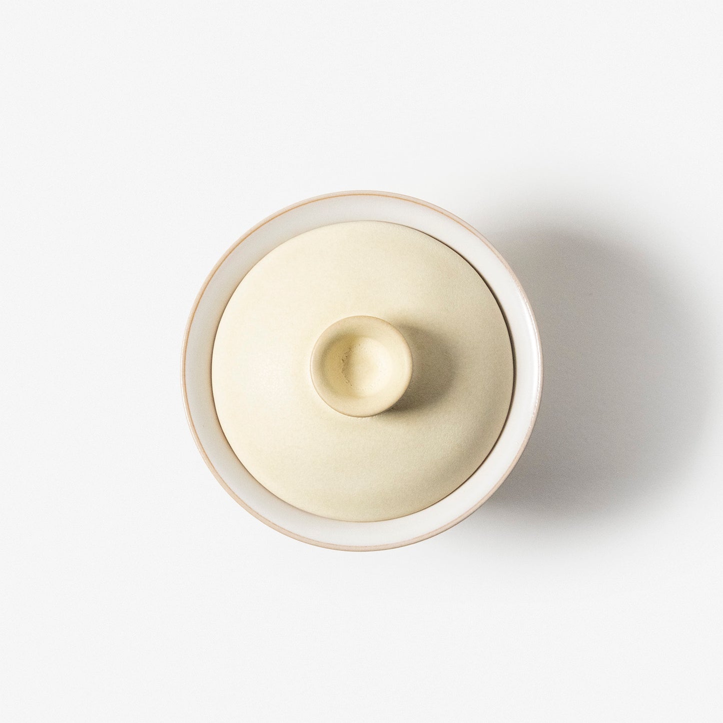A refined Dehua porcelain teaware and tableware piece, crafted in the kilns of Fujian with a legacy dating back to ancient China; this minimalist yet culturally rich ceramic reflects the purity of Eastern craftsmanship, blending seamlessly into modern interiors inspired by Chinese tradition, ritual, and timeless design. Hog Lane, London Based Chinese homeware UK