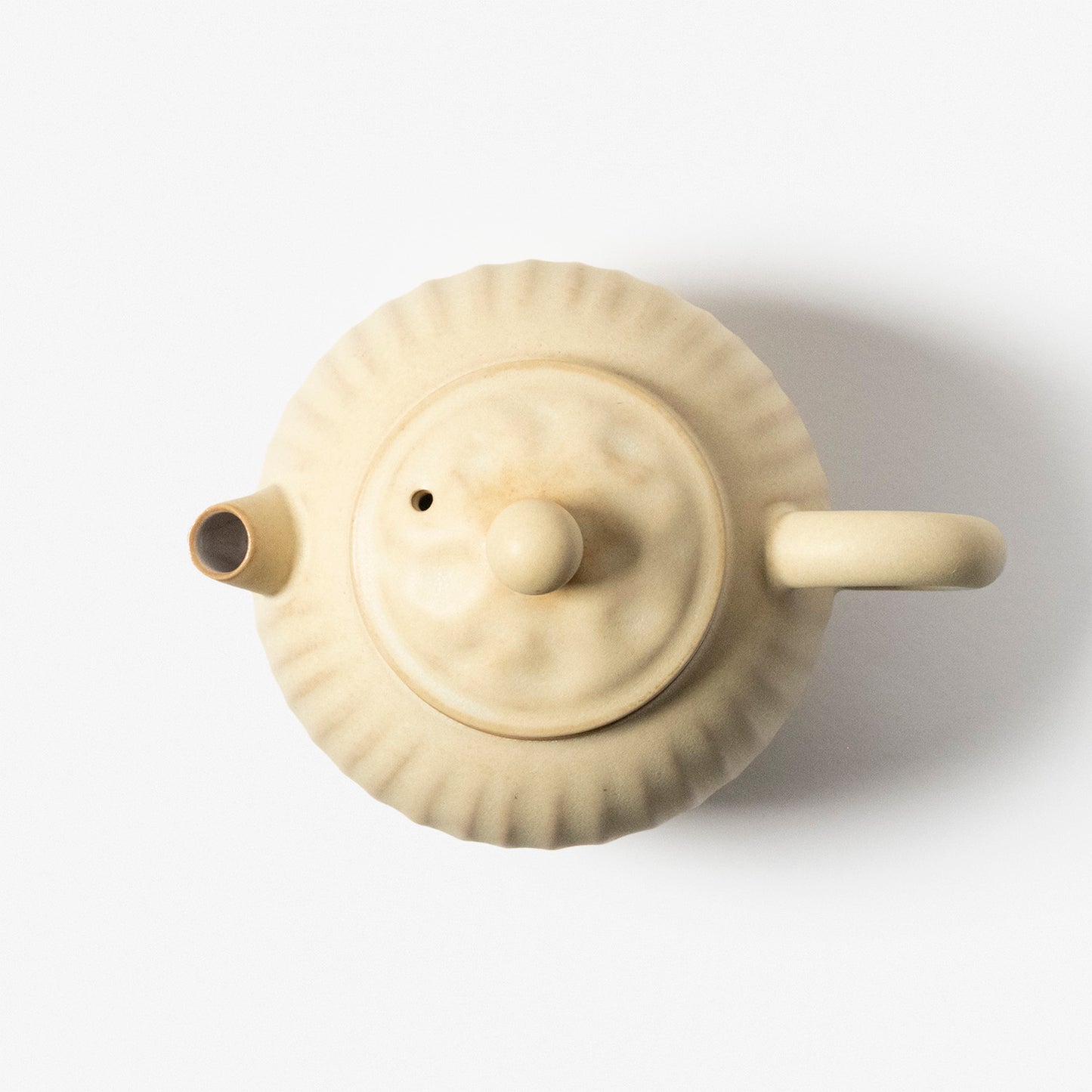 A refined Dehua porcelain teaware and tableware piece, crafted in the kilns of Fujian with a legacy dating back to ancient China; this minimalist yet culturally rich ceramic reflects the purity of Eastern craftsmanship, blending seamlessly into modern interiors inspired by Chinese tradition, ritual, and timeless design. Hog Lane, London Based Chinese homeware UK
