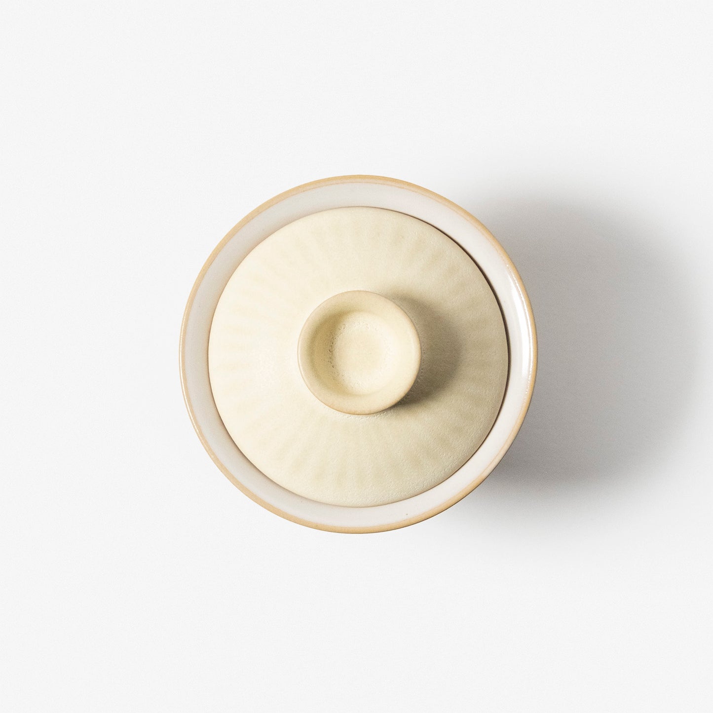 A refined Dehua porcelain teaware and tableware piece, crafted in the kilns of Fujian with a legacy dating back to ancient China; this minimalist yet culturally rich ceramic reflects the purity of Eastern craftsmanship, blending seamlessly into modern interiors inspired by Chinese tradition, ritual, and timeless design. Hog Lane, London Based Chinese homeware UK