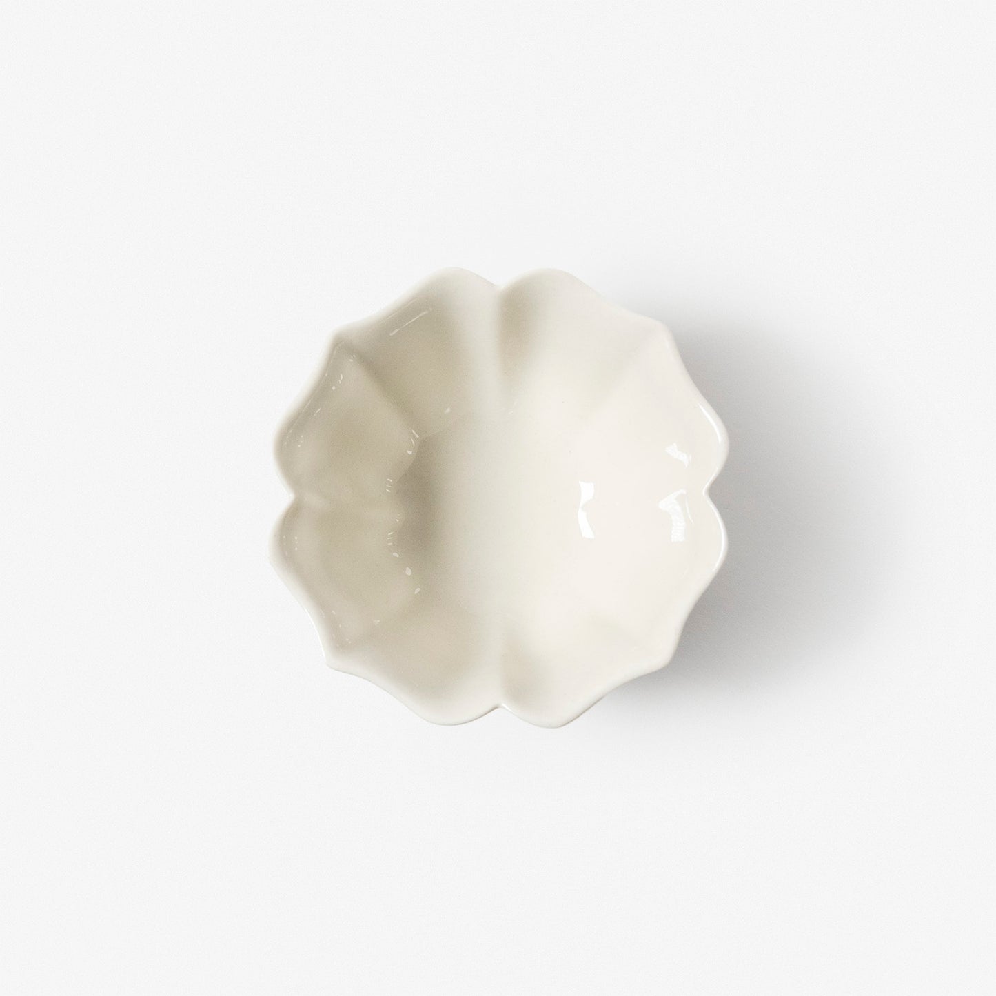 A refined Dehua porcelain teaware and tableware piece, crafted in the kilns of Fujian with a legacy dating back to ancient China; this minimalist yet culturally rich ceramic reflects the purity of Eastern craftsmanship, blending seamlessly into modern interiors inspired by Chinese tradition, ritual, and timeless design. Hog Lane, London Based Chinese homeware UK