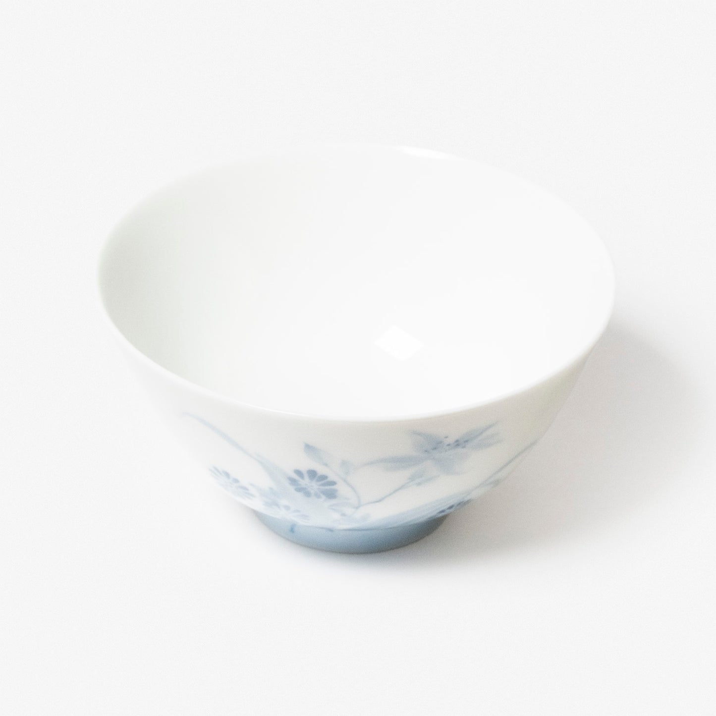 A refined Dehua porcelain teaware and tableware piece, crafted in the kilns of Fujian with a legacy dating back to ancient China; this minimalist yet culturally rich ceramic reflects the purity of Eastern craftsmanship, blending seamlessly into modern interiors inspired by Chinese tradition, ritual, and timeless design. Hog Lane, London Based Chinese homeware UK