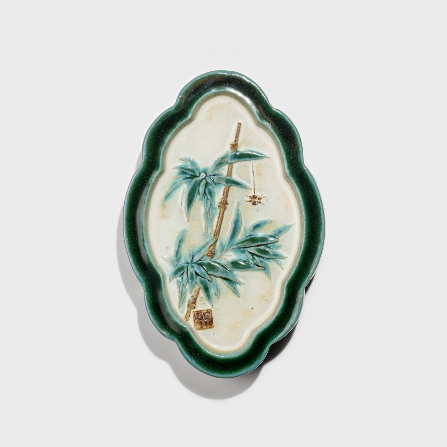 Shiwan handcrafted ceramic wall art depicting bamboo, traditional Chinese hanging vase with Cantonese glaze technique.