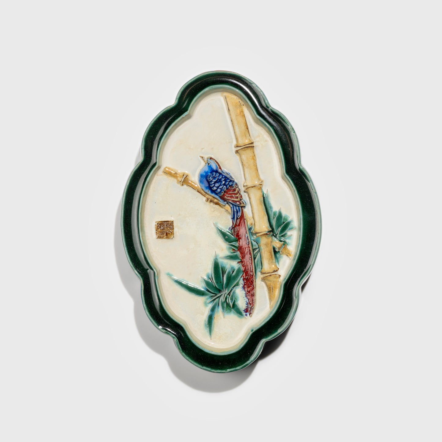 Shiwan handcrafted ceramic wall art depicting bamboo, traditional Chinese hanging vase with Cantonese glaze technique.
