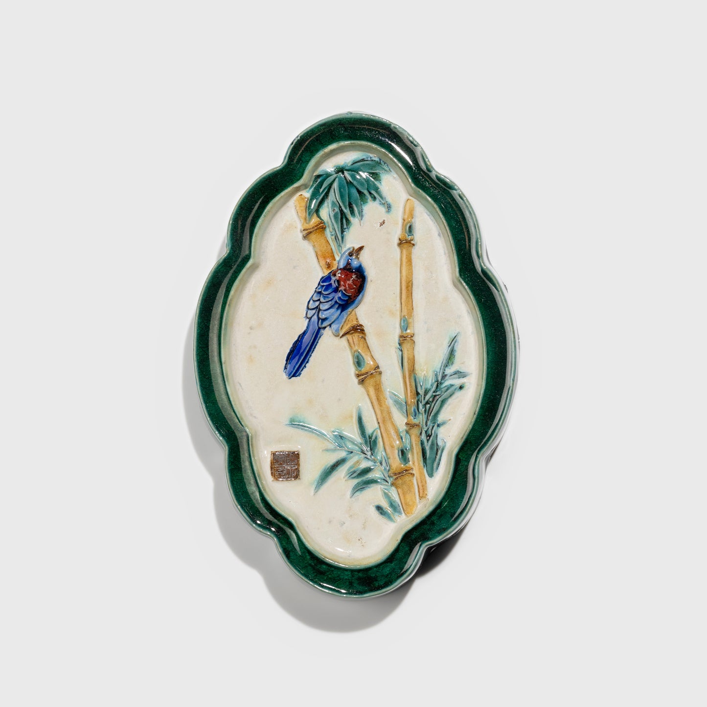 Shiwan handcrafted ceramic wall art depicting bamboo, traditional Chinese hanging vase with Cantonese glaze technique.