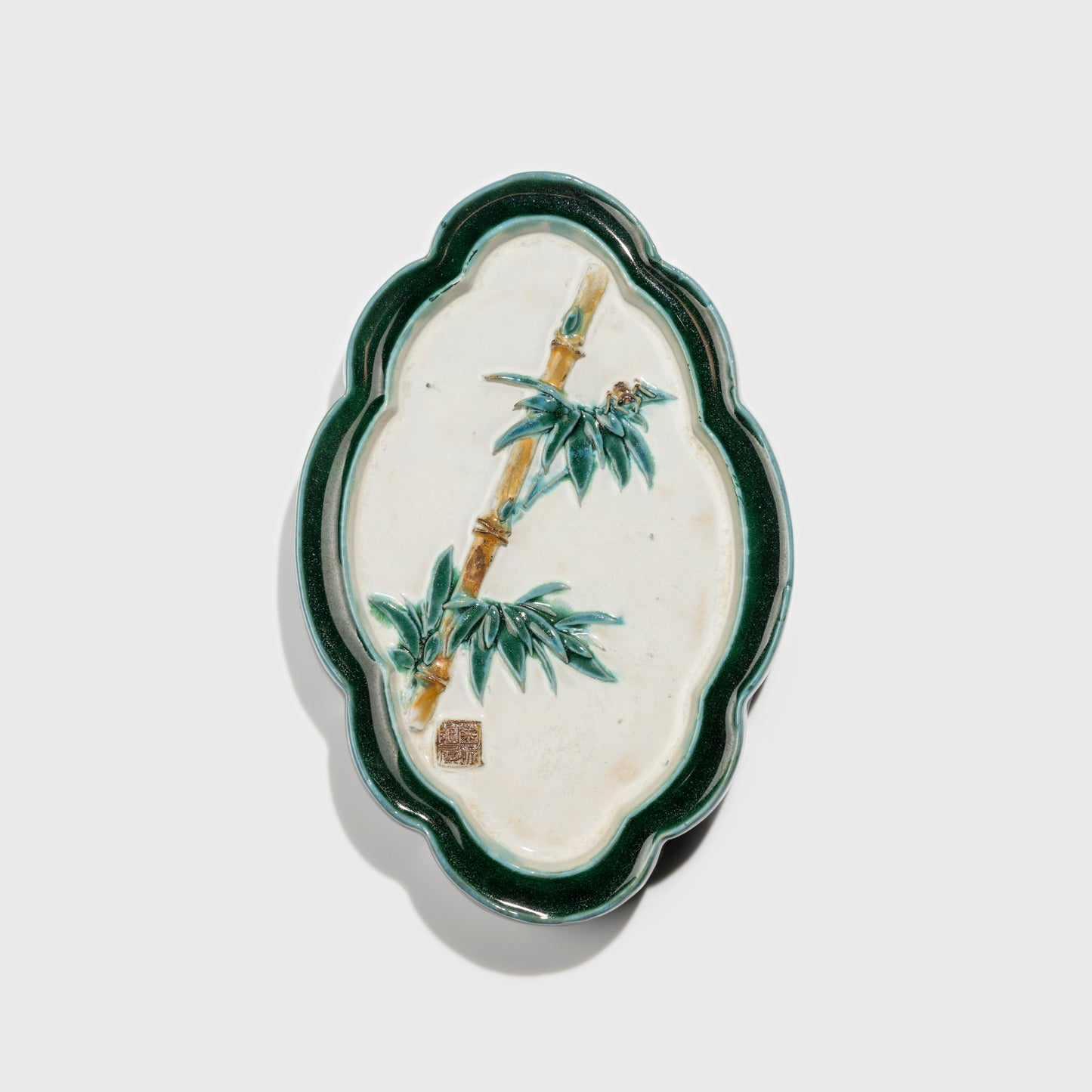 Shiwan handcrafted ceramic wall art depicting bamboo, traditional Chinese hanging vase with Cantonese glaze technique.