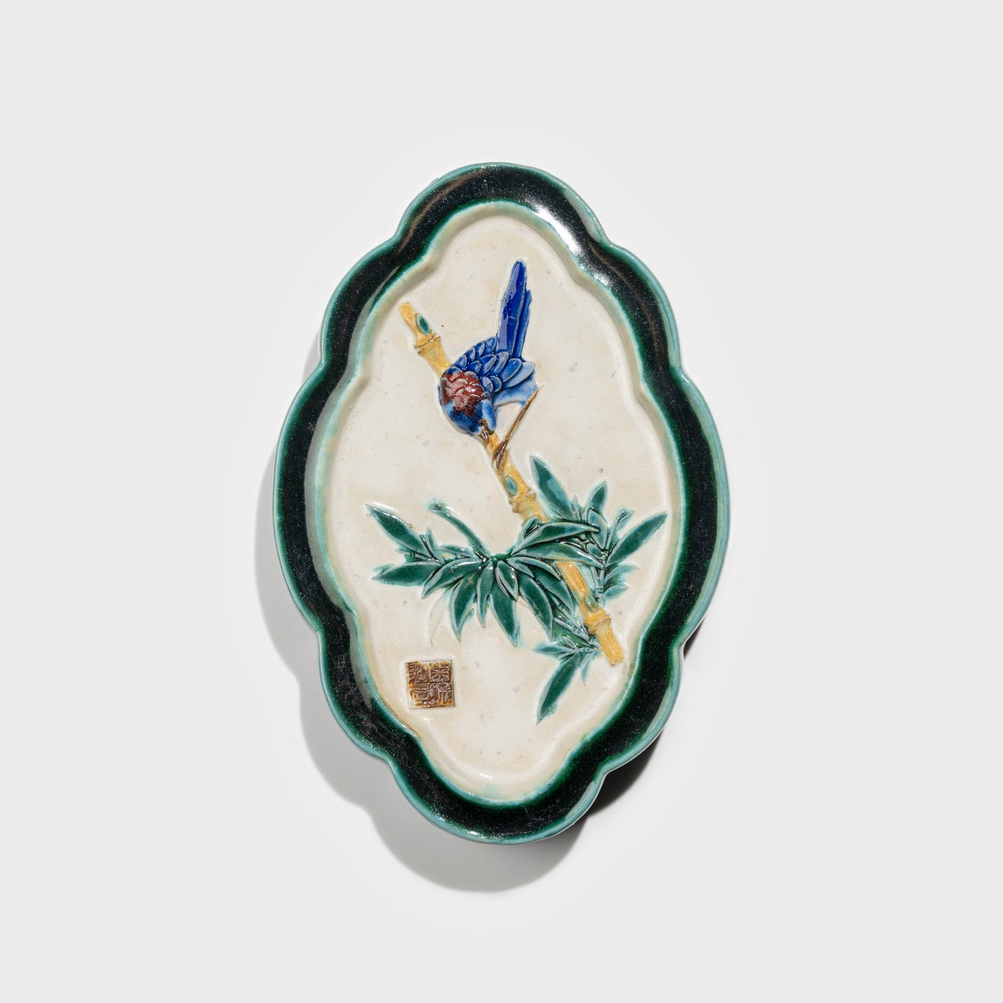 Shiwan handcrafted ceramic wall art depicting bamboo, traditional Chinese hanging vase with Cantonese glaze technique.