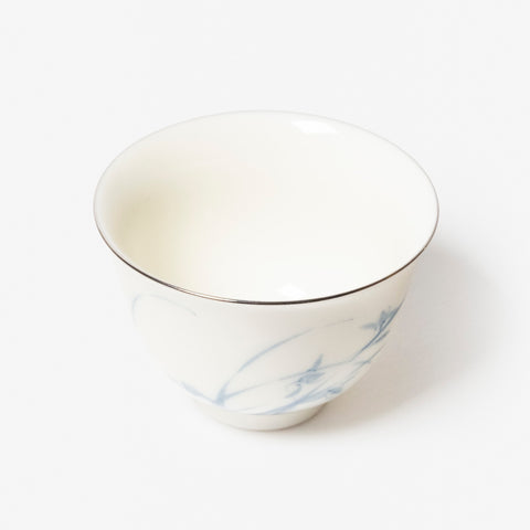 A refined Dehua porcelain teaware and tableware piece, crafted in the kilns of Fujian with a legacy dating back to ancient China; this minimalist yet culturally rich ceramic reflects the purity of Eastern craftsmanship, blending seamlessly into modern interiors inspired by Chinese tradition, ritual, and timeless design. Hog Lane, London Based Chinese homeware UK