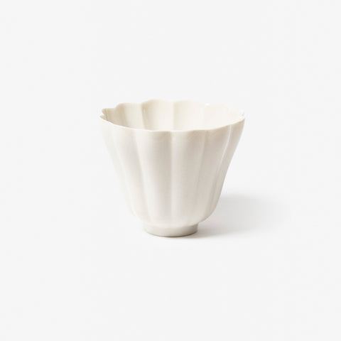 A refined Dehua porcelain teaware and tableware piece, crafted in the kilns of Fujian with a legacy dating back to ancient China; this minimalist yet culturally rich ceramic reflects the purity of Eastern craftsmanship, blending seamlessly into modern interiors inspired by Chinese tradition, ritual, and timeless design. Hog Lane, London Based Chinese homeware UK