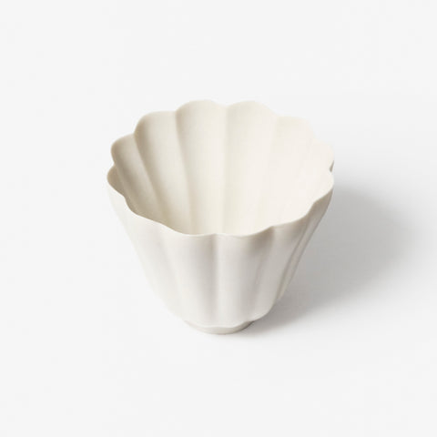 A refined Dehua porcelain teaware and tableware piece, crafted in the kilns of Fujian with a legacy dating back to ancient China; this minimalist yet culturally rich ceramic reflects the purity of Eastern craftsmanship, blending seamlessly into modern interiors inspired by Chinese tradition, ritual, and timeless design. Hog Lane, London Based Chinese homeware UK