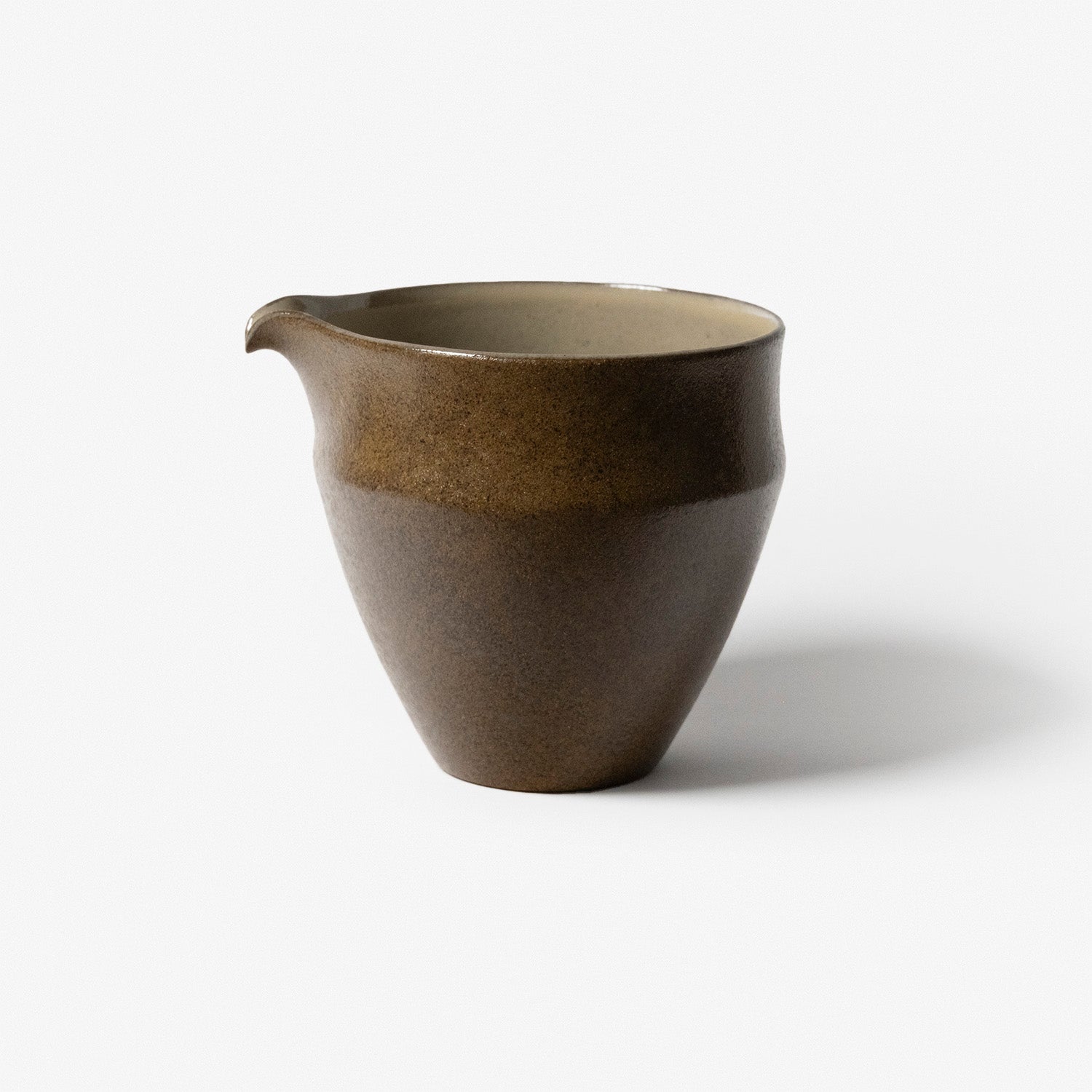 A refined Dehua porcelain teaware and tableware piece, crafted in the kilns of Fujian with a legacy dating back to ancient China; this minimalist yet culturally rich ceramic reflects the purity of Eastern craftsmanship, blending seamlessly into modern interiors inspired by Chinese tradition, ritual, and timeless design. Hog Lane, London Based Chinese homeware UK
