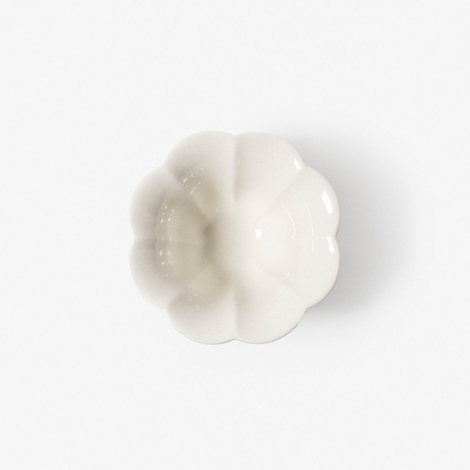 A refined Dehua porcelain teaware and tableware piece, crafted in the kilns of Fujian with a legacy dating back to ancient China; this minimalist yet culturally rich ceramic reflects the purity of Eastern craftsmanship, blending seamlessly into modern interiors inspired by Chinese tradition, ritual, and timeless design. Hog Lane, London Based Chinese homeware UK