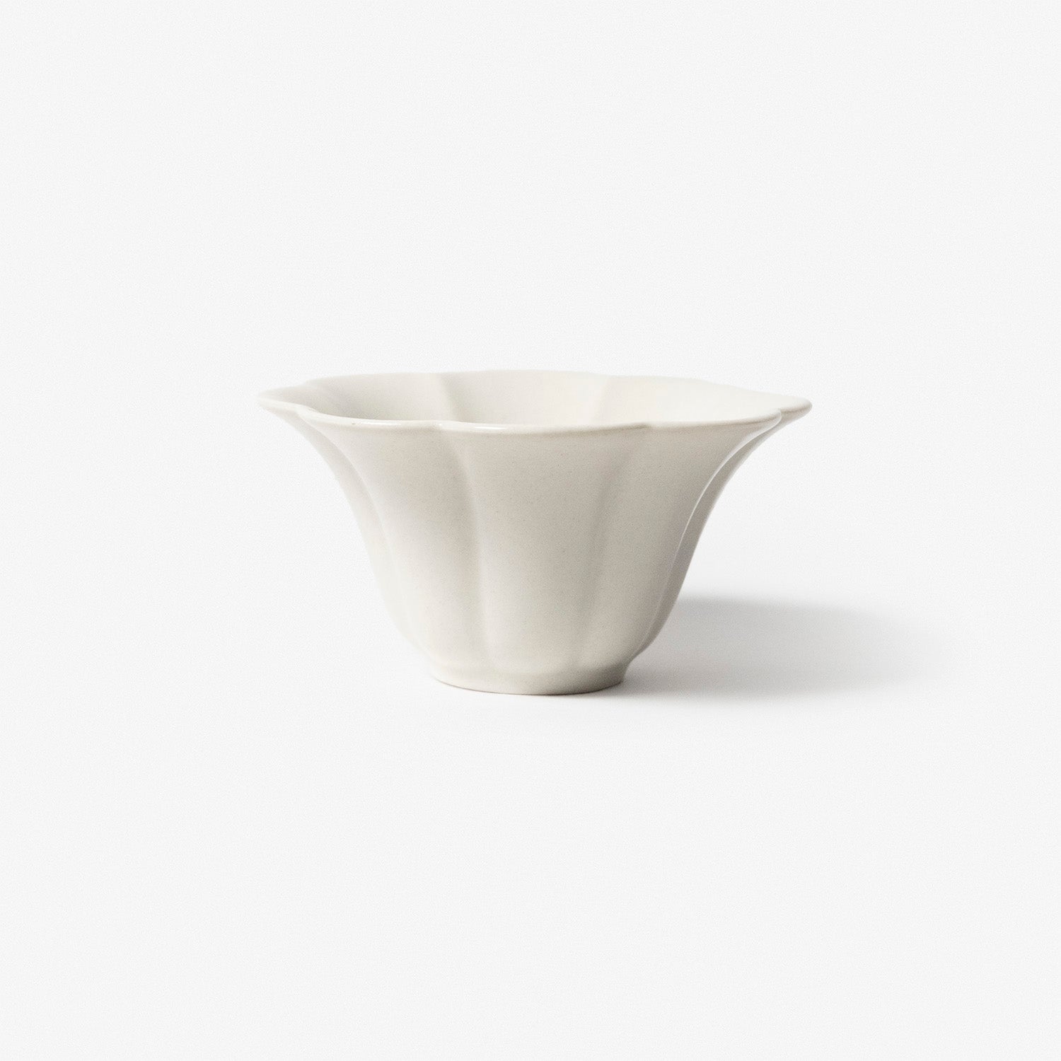 A refined Dehua porcelain teaware and tableware piece, crafted in the kilns of Fujian with a legacy dating back to ancient China; this minimalist yet culturally rich ceramic reflects the purity of Eastern craftsmanship, blending seamlessly into modern interiors inspired by Chinese tradition, ritual, and timeless design. Hog Lane, London Based Chinese homeware UK