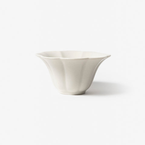 A refined Dehua porcelain teaware and tableware piece, crafted in the kilns of Fujian with a legacy dating back to ancient China; this minimalist yet culturally rich ceramic reflects the purity of Eastern craftsmanship, blending seamlessly into modern interiors inspired by Chinese tradition, ritual, and timeless design. Hog Lane, London Based Chinese homeware UK