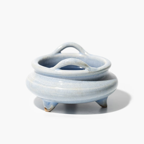 Sky Blue Tripod Incense Burner, HOG LANE, A handcrafted Shiwan ceramic piece made using traditional kiln-fired techniques from southern China, showcasing the unique glaze patterns, symbolic forms, and sculptural artistry rooted in Cantonese heritage; this oriental decorative item brings timeless Chinese craftsmanship and cultural elegance into modern interior spaces.

Collectible with traditional Chinese glaze and cultural symbolism, ideal for antique lovers and oriental art collectors.