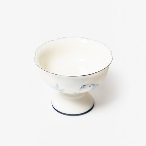 A refined Dehua porcelain teaware and tableware piece, crafted in the kilns of Fujian with a legacy dating back to ancient China; this minimalist yet culturally rich ceramic reflects the purity of Eastern craftsmanship, blending seamlessly into modern interiors inspired by Chinese tradition, ritual, and timeless design. Hog Lane, London Based Chinese homeware UK