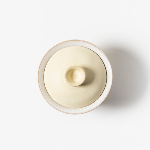 A refined Dehua porcelain teaware and tableware piece, crafted in the kilns of Fujian with a legacy dating back to ancient China; this minimalist yet culturally rich ceramic reflects the purity of Eastern craftsmanship, blending seamlessly into modern interiors inspired by Chinese tradition, ritual, and timeless design. Hog Lane, London Based Chinese homeware UK