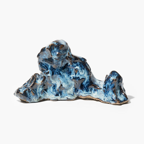 Scholar’s Rock-Inspired Paperweight, Hog Lane. A handcrafted Shiwan ceramic piece made using traditional kiln-fired techniques from southern China, showcasing the unique glaze patterns, symbolic forms, and sculptural artistry rooted in Cantonese heritage; this oriental decorative item brings timeless Chinese craftsmanship and cultural elegance into modern interior spaces. Collectible with traditional Chinese glaze and cultural symbolism, ideal for antique lovers and oriental art collectors.