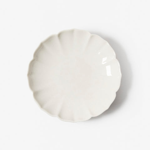 A refined Dehua porcelain teaware and tableware piece, crafted in the kilns of Fujian with a legacy dating back to ancient China; this minimalist yet culturally rich ceramic reflects the purity of Eastern craftsmanship, blending seamlessly into modern interiors inspired by Chinese tradition, ritual, and timeless design. Hog Lane, London Based Chinese homeware UK