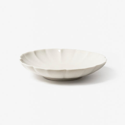 A refined Dehua porcelain teaware and tableware piece, crafted in the kilns of Fujian with a legacy dating back to ancient China; this minimalist yet culturally rich ceramic reflects the purity of Eastern craftsmanship, blending seamlessly into modern interiors inspired by Chinese tradition, ritual, and timeless design. Hog Lane, London Based Chinese homeware UK