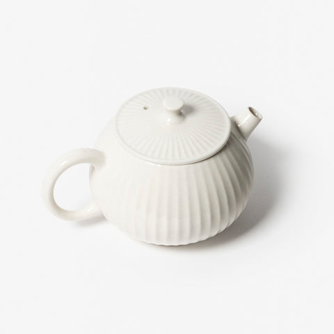 A refined Dehua porcelain teaware and tableware piece, crafted in the kilns of Fujian with a legacy dating back to ancient China; this minimalist yet culturally rich ceramic reflects the purity of Eastern craftsmanship, blending seamlessly into modern interiors inspired by Chinese tradition, ritual, and timeless design. Hog Lane, London Based Chinese homeware UK