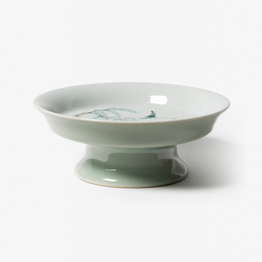 A refined Dehua porcelain teaware and tableware piece, crafted in the kilns of Fujian with a legacy dating back to ancient China; this minimalist yet culturally rich ceramic reflects the purity of Eastern craftsmanship, blending seamlessly into modern interiors inspired by Chinese tradition, ritual, and timeless design. Hog Lane, London Based Chinese homeware UK