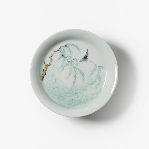 A refined Dehua porcelain teaware and tableware piece, crafted in the kilns of Fujian with a legacy dating back to ancient China; this minimalist yet culturally rich ceramic reflects the purity of Eastern craftsmanship, blending seamlessly into modern interiors inspired by Chinese tradition, ritual, and timeless design. Hog Lane, London Based Chinese homeware UK