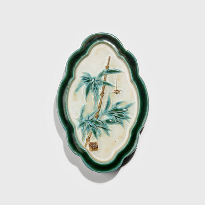 Shiwan handcrafted ceramic wall art depicting bamboo, traditional Chinese hanging vase with Cantonese glaze technique.