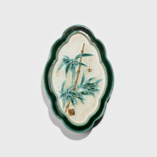 Shiwan handcrafted ceramic wall art depicting bamboo, traditional Chinese hanging vase with Cantonese glaze technique.