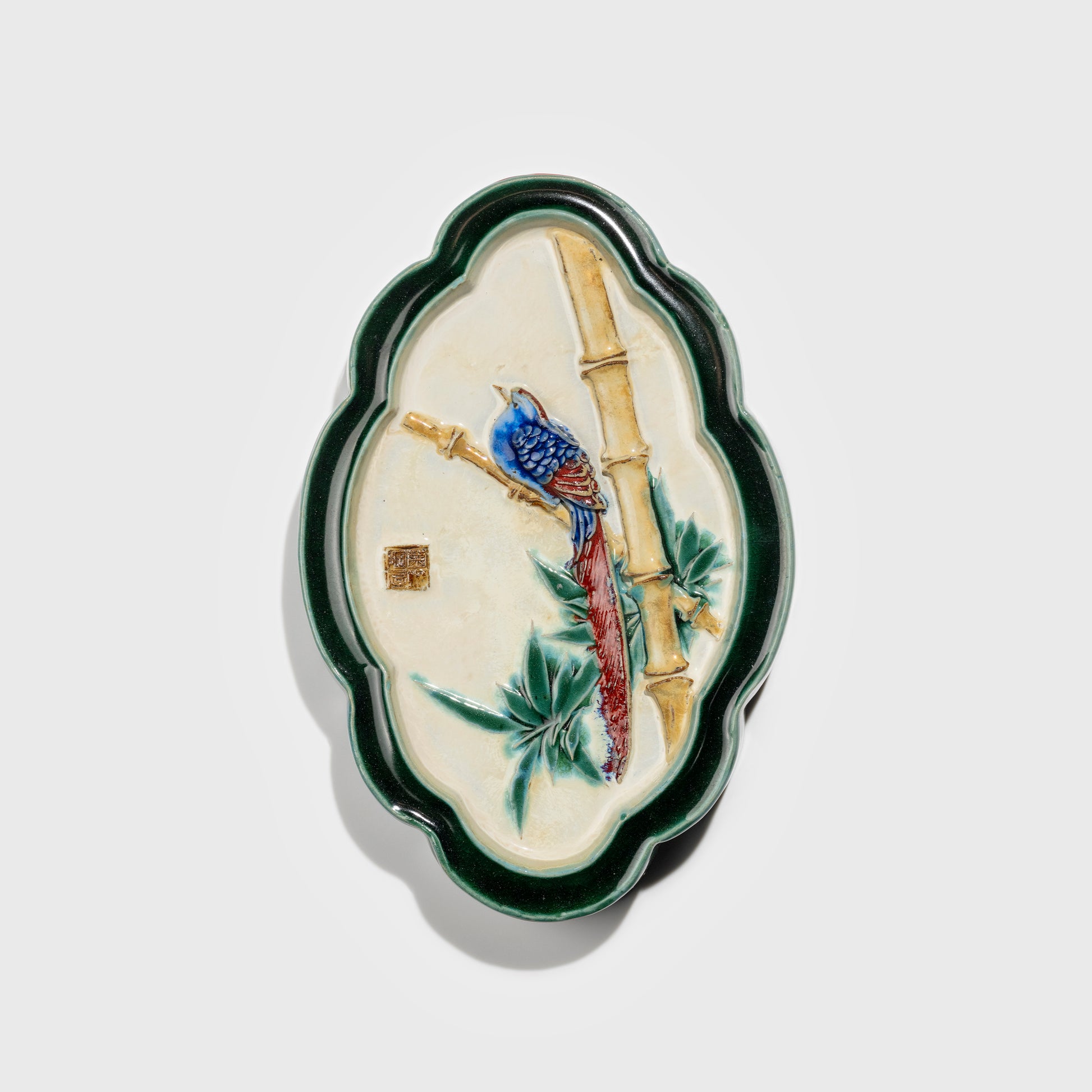 Shiwan handcrafted ceramic wall art depicting bamboo, traditional Chinese hanging vase with Cantonese glaze technique.