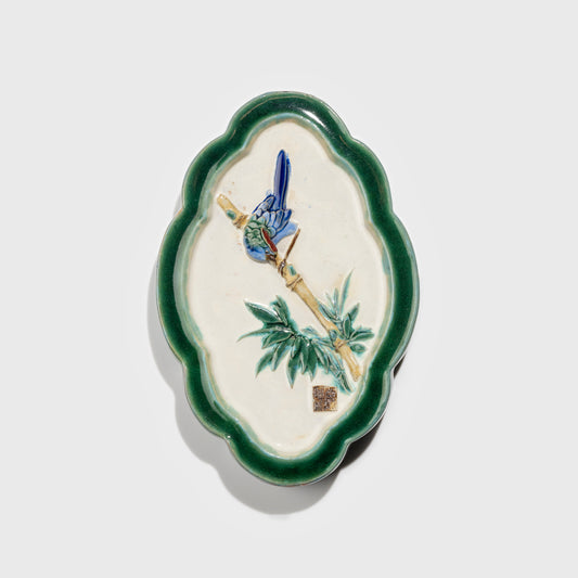 Shiwan handcrafted ceramic wall art depicting bamboo, traditional Chinese hanging vase with Cantonese glaze technique.