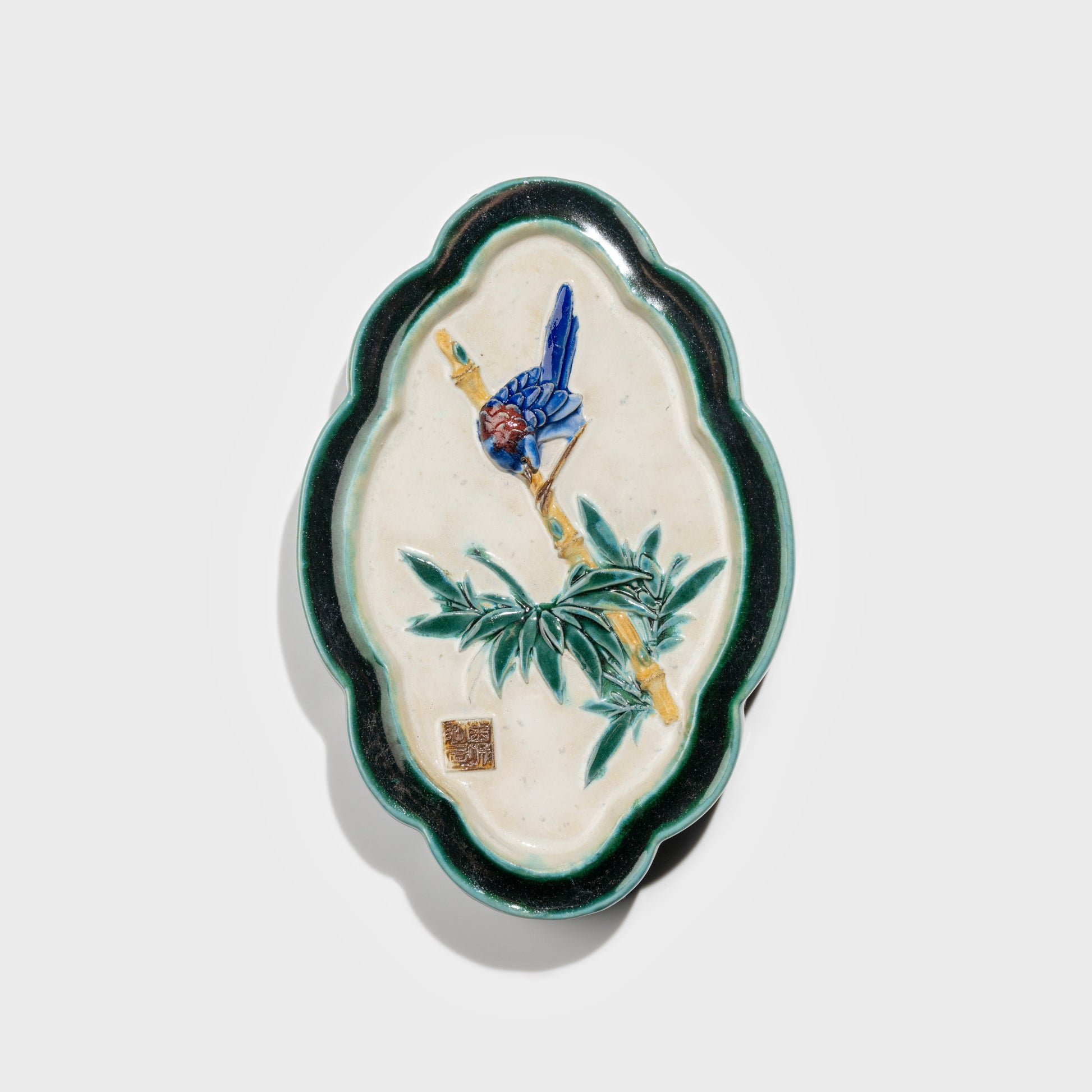 Shiwan handcrafted ceramic wall art depicting bamboo, traditional Chinese hanging vase with Cantonese glaze technique.