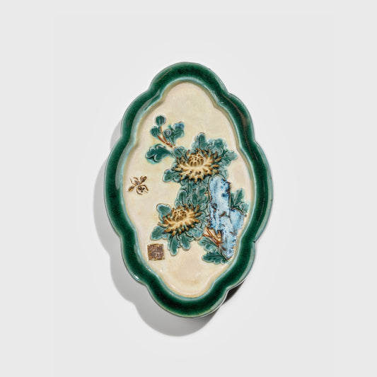 Shiwan handcrafted ceramic wall art depicting chrysanthemums, traditional Chinese hanging vase with Cantonese glaze technique.