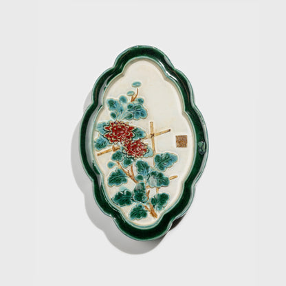 Shiwan handcrafted ceramic wall art depicting chrysanthemums, traditional Chinese hanging vase with Cantonese glaze technique.