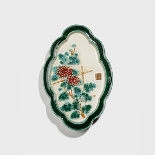 Shiwan handcrafted ceramic wall art depicting chrysanthemums, traditional Chinese hanging vase with Cantonese glaze technique.