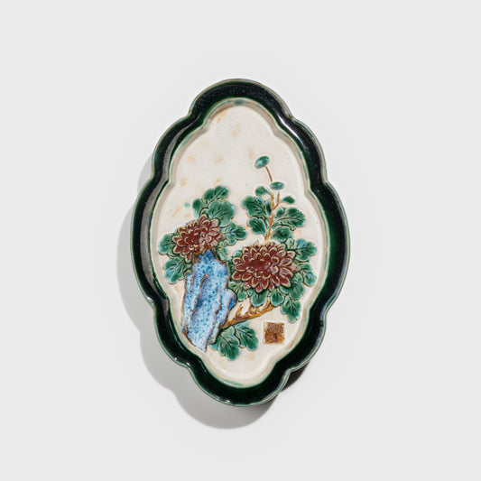 Shiwan handcrafted ceramic wall art depicting chrysanthemums, traditional Chinese hanging vase with Cantonese glaze technique.
