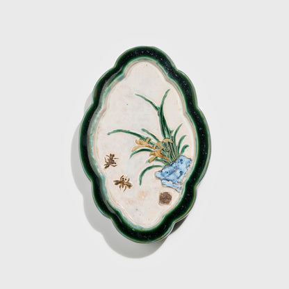 Shiwan handcrafted ceramic wall art depicting orchid, traditional Chinese hanging vase with Cantonese glaze technique.